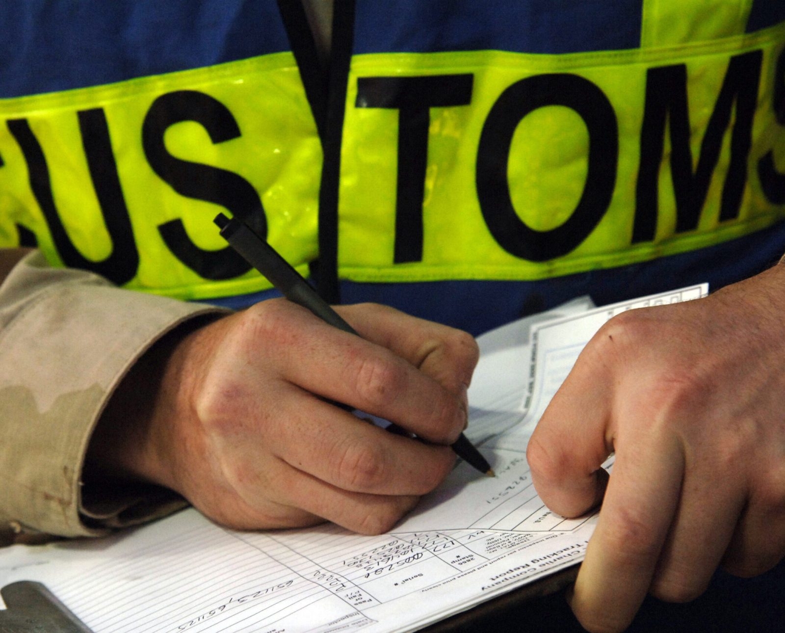 061209-N-8148A-067
Camp Patriot, Kuwait (Dec. 9, 2006) - A customs border clearance agent assigned to Navy Customs Battalion Romeo keeps record of each inspection. Navy Customs Battalion Romeo, comprised of more than 450 reservists, was mobilized, trained, equipped and deployed by the Navy Expeditionary Logistics Support Group and is an operational force under the Navy Expeditionary Combat Command. U.S. Navy photo by Mass Communication Specialist 2nd Class Kitt Amaritnant (RELEASED)